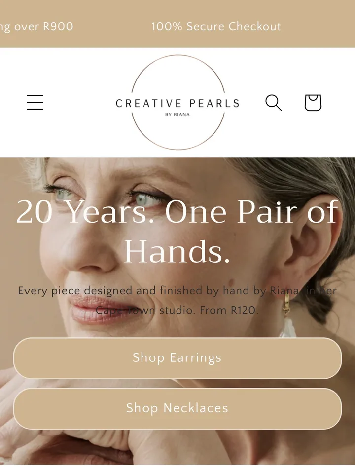 Creative Pearls homepage on a phone